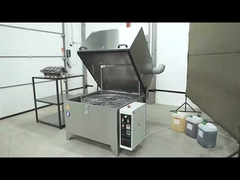 Sprühreinigungsmaschine mit Drehkorb zum Reinigen des Motorblocks